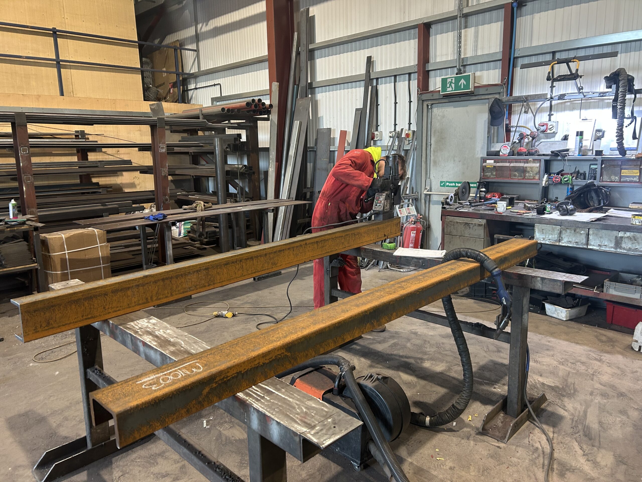 Cut-to-size steel builders beams ready for delivery