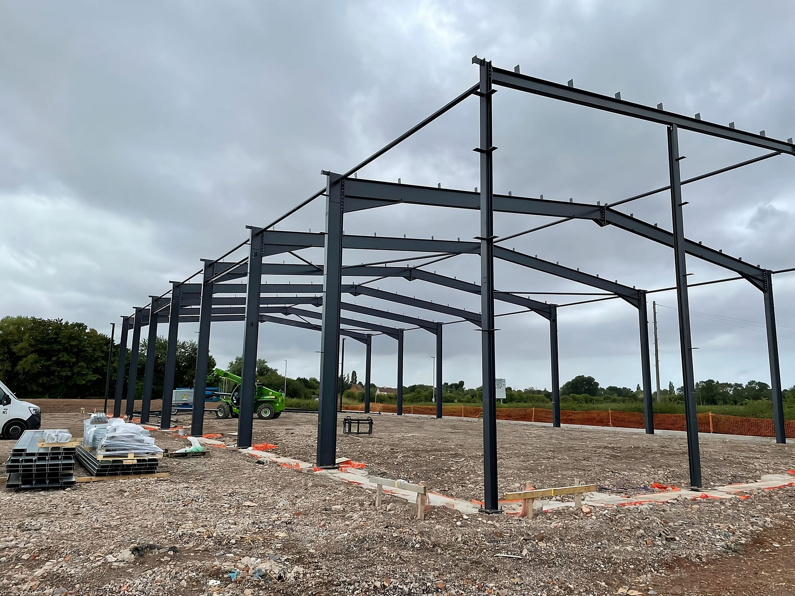 Steel-frame building under construction in Devon by W.E. Phillips & Sons